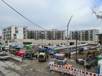 Baustelle in Gauting mit Bagger, Traktor, Betonmischger&auml;t, Bausteine unter der Bauherrschaft von Peter Schulz - Mittelstandsberatung &amp; Projektsteuerung